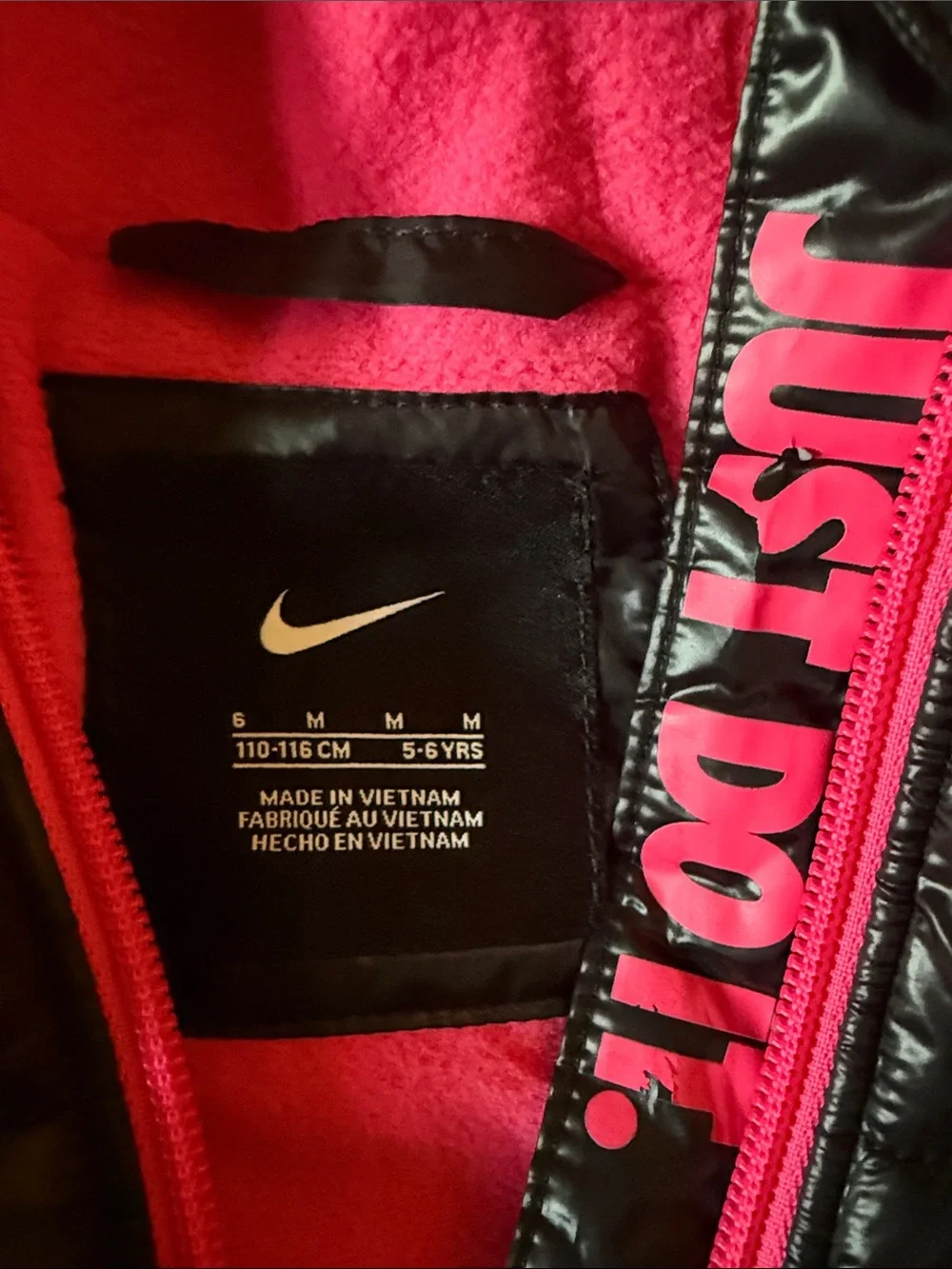Nike Black Puffer Jacket with Pink Trim for Kids